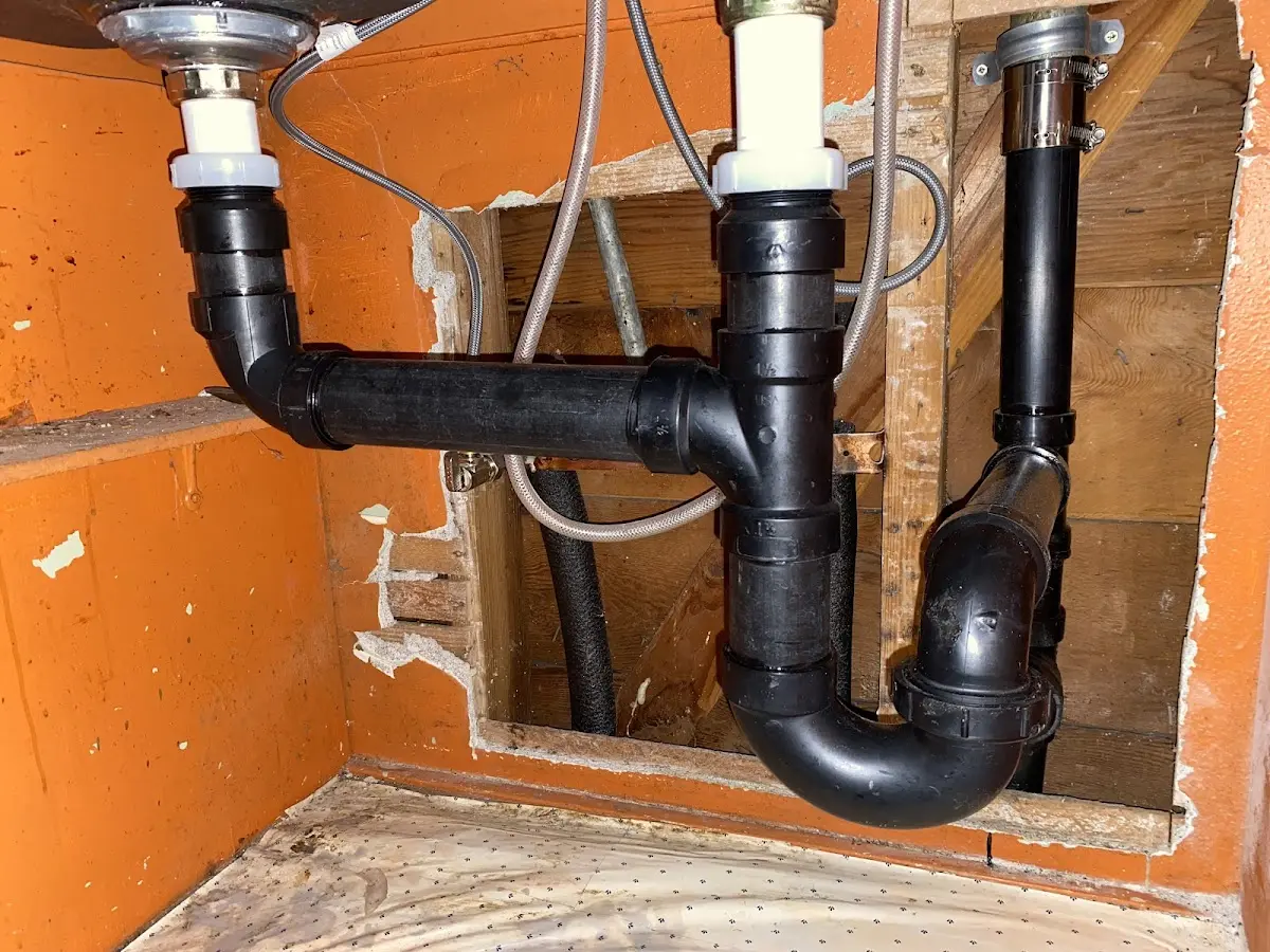 Professional Garbage Disposal Repair equipment and tools on the job in Northchase